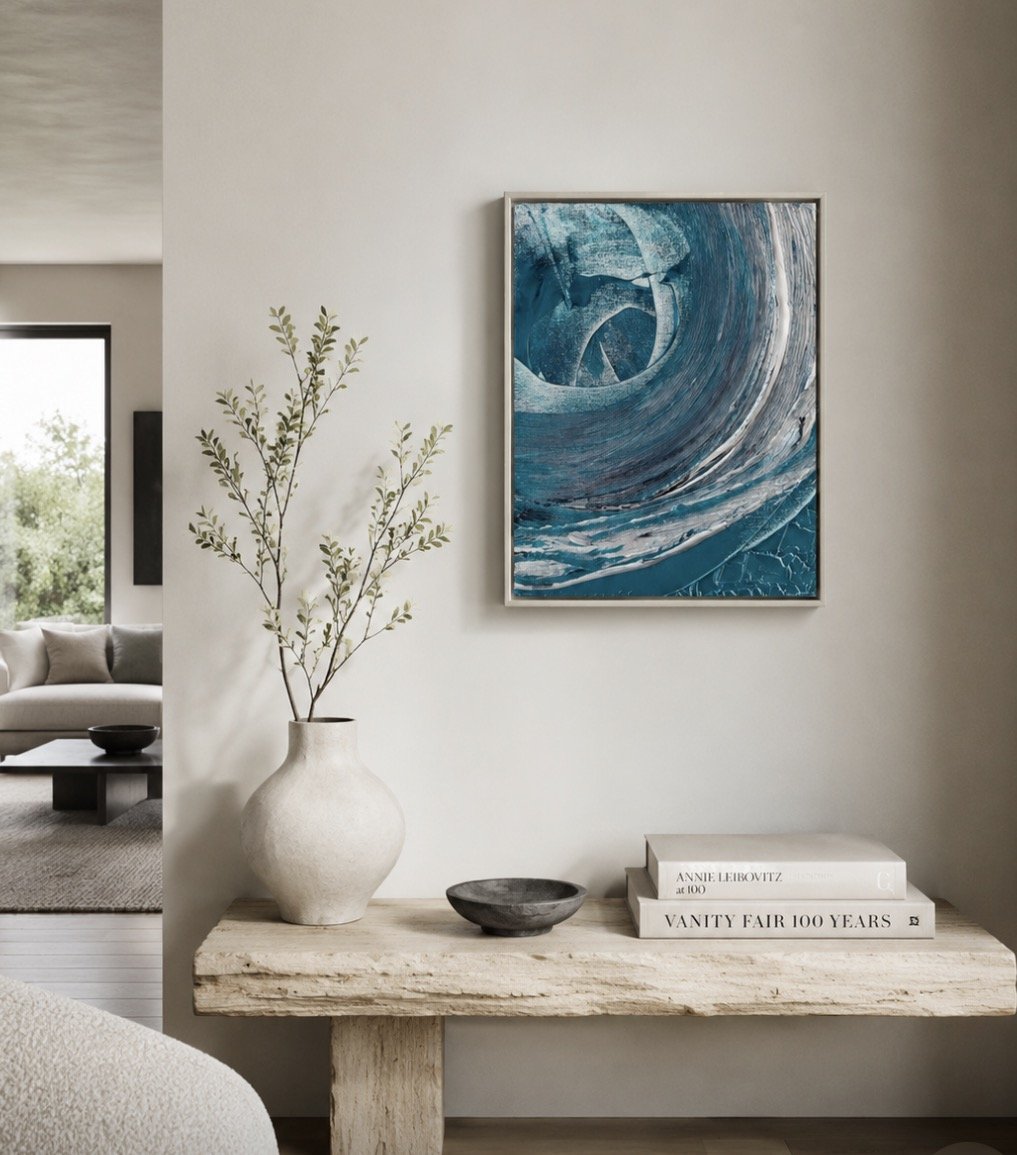 Invitation by Amy Buckner Chowdhry displayed in a warm foyer.