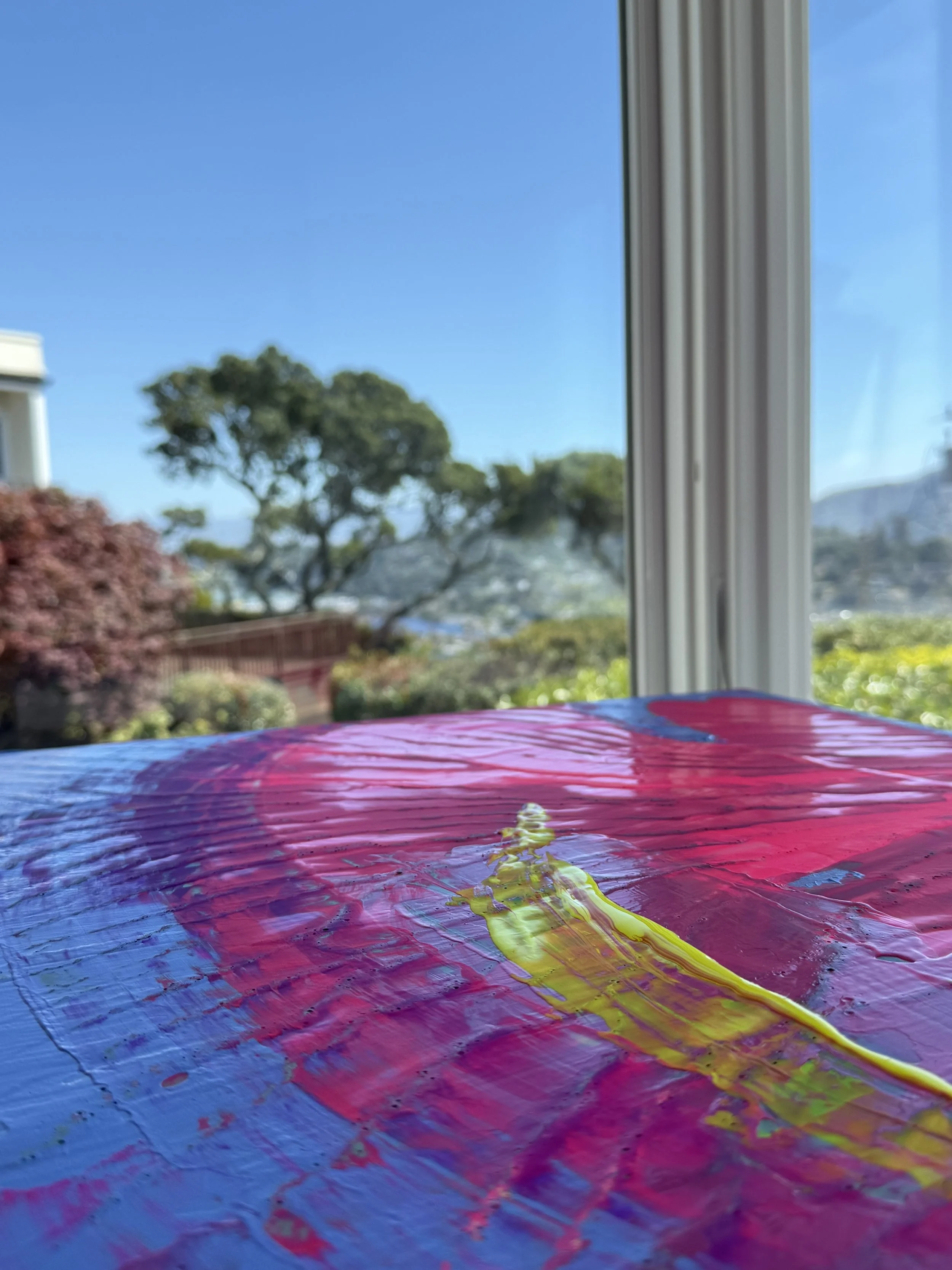 Paint colors inspired by San Francisco sunsets in Amy Buckner Chowdhry's Tiburon art studio.