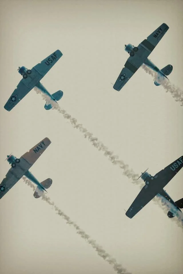 Airshow performance over Minneapolis waterfront during Aquatennial festival and public event programming