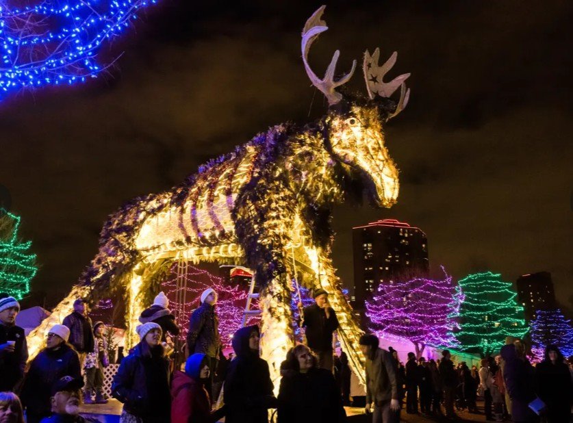Nighttime entertainment activation with moose art structure at Holizdazzle featuring immersive event production and coordination