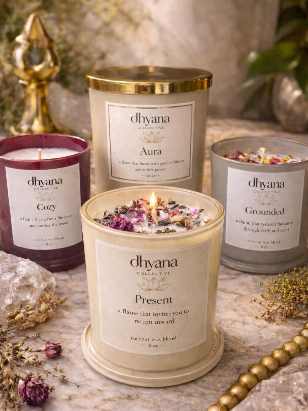 Four scented candles from Dhyana Collective, labeled Cozy, Aura, Grounded, and Present, are apart of the first collection titled, The Stillness Collection.