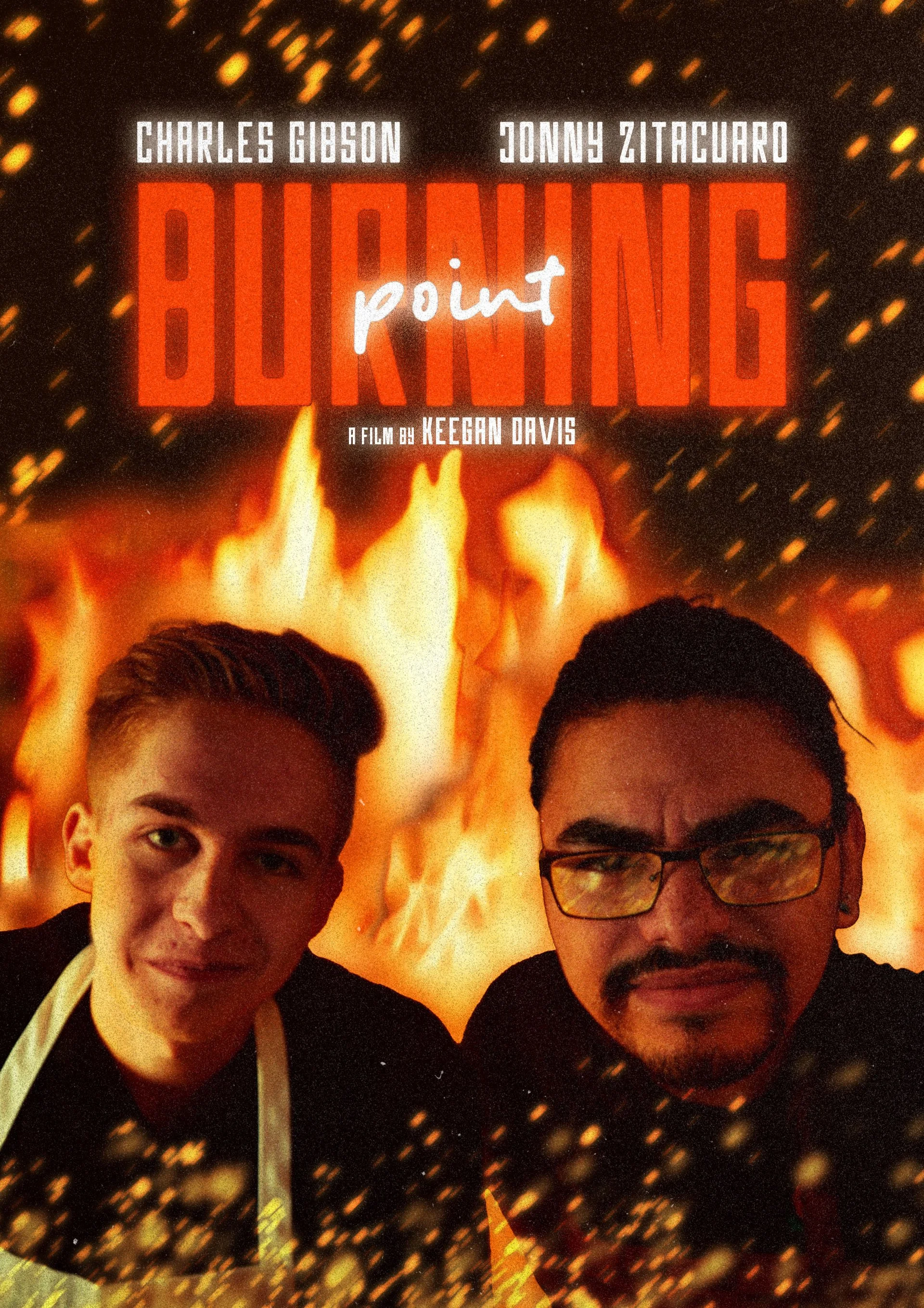 Portraying two men in front of a fiery background, with the movie title 'Burning Point' and credits at the top.