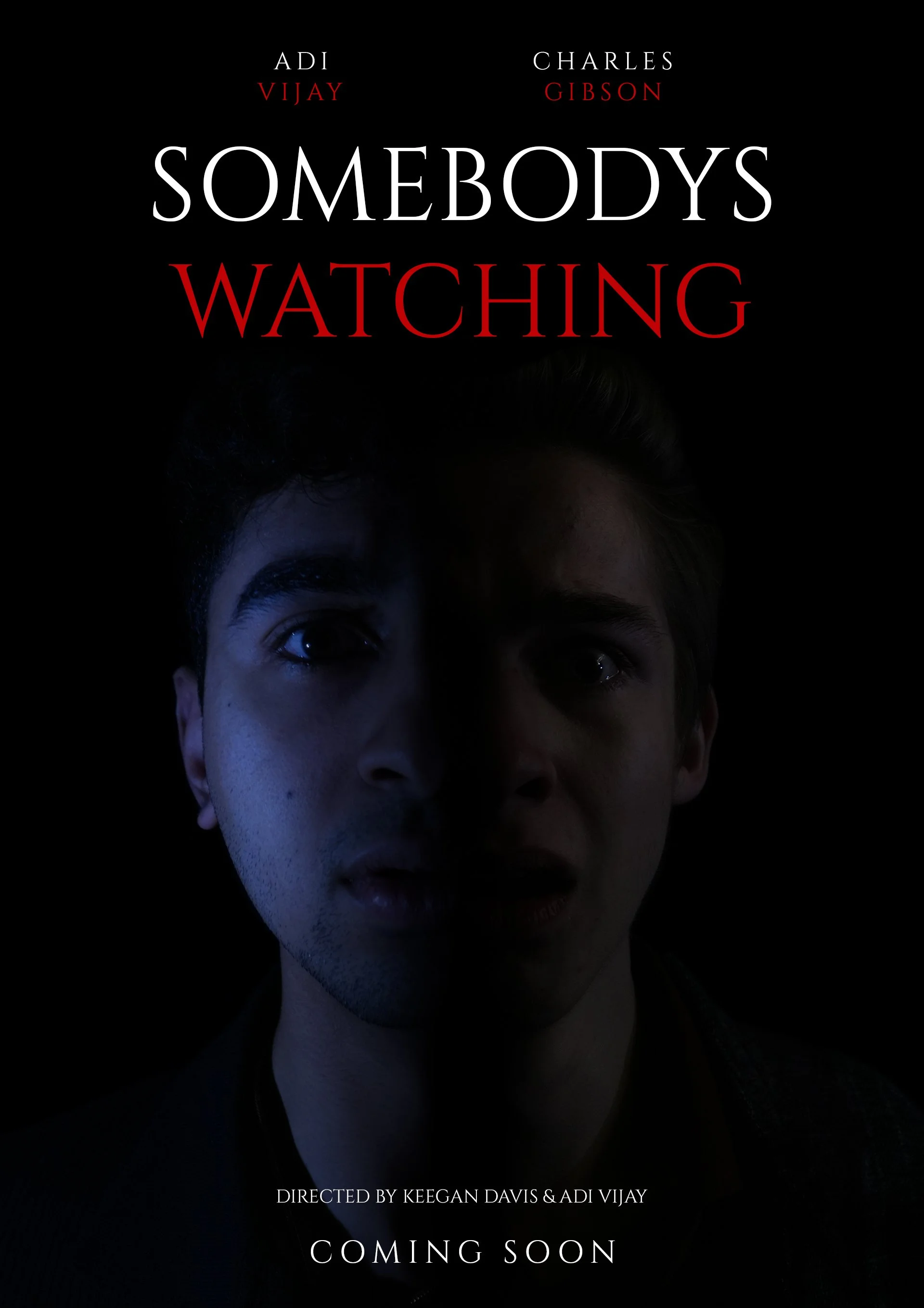 Dark poster for the movie "Somebodys Watching" featuring split faces of two young men, with the title in large white and red letters, and the tagline "Coming Soon" at the bottom.