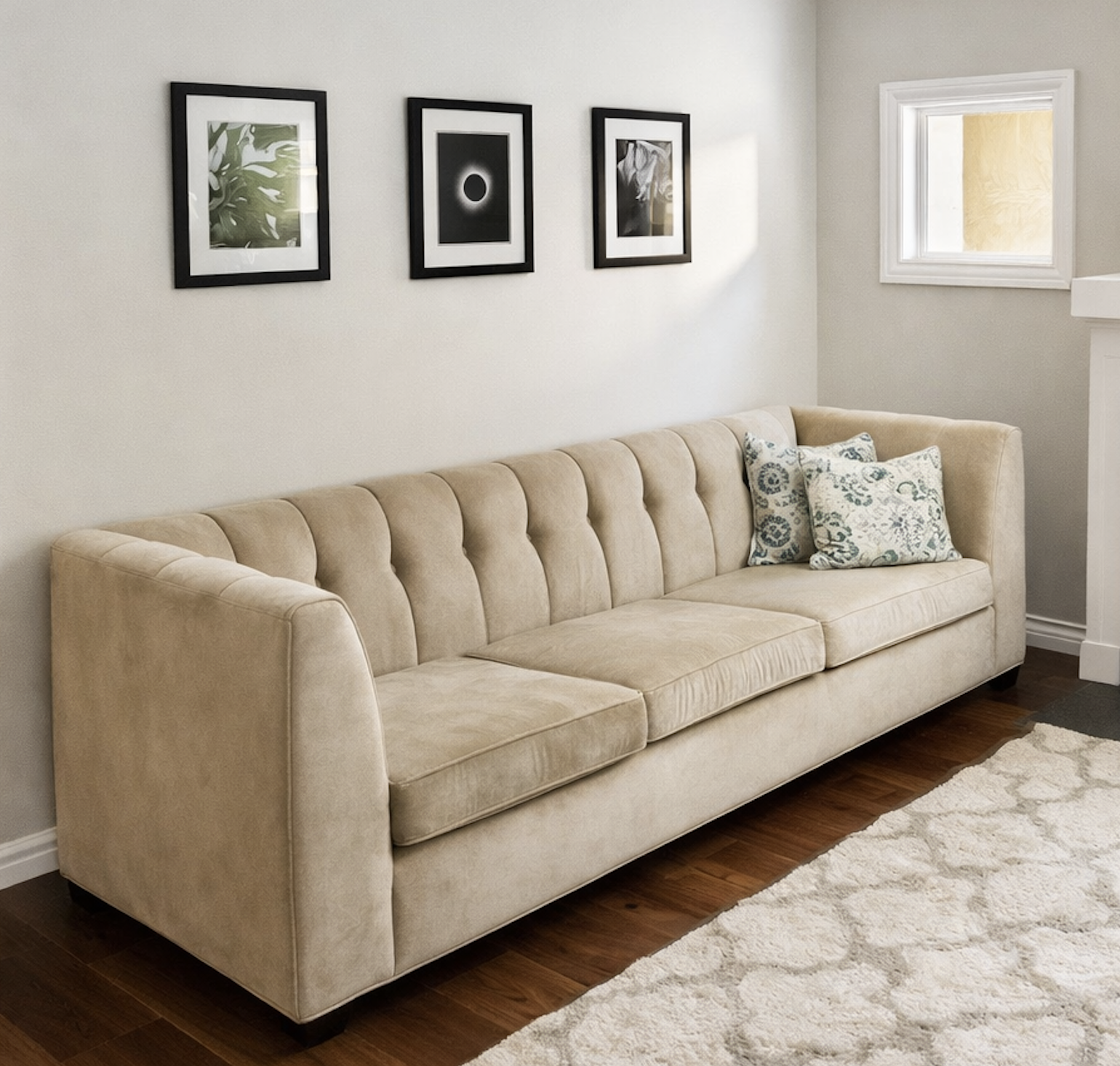 Custom upholstered sofa with tufted back in San Diego home