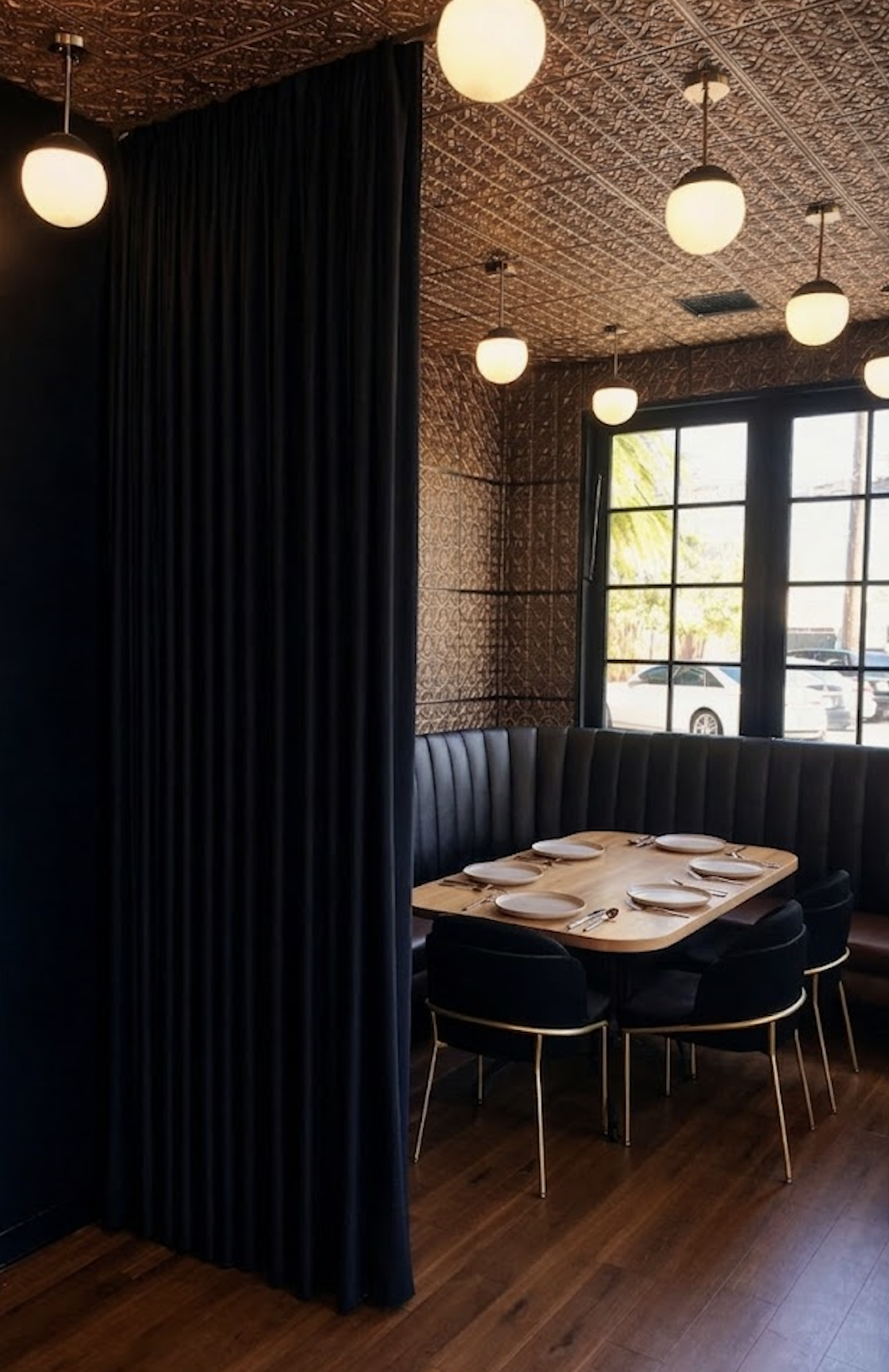 Custom drapery divider panels for restaurant seating in San Diego