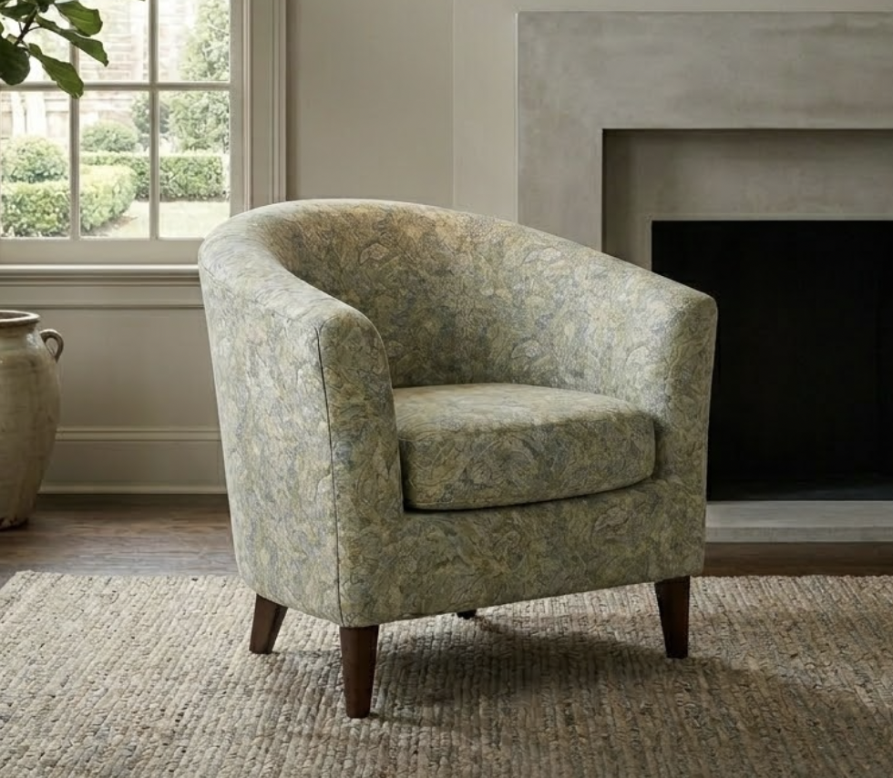 Custom upholstered accent chair with patterned fabric in San Diego home