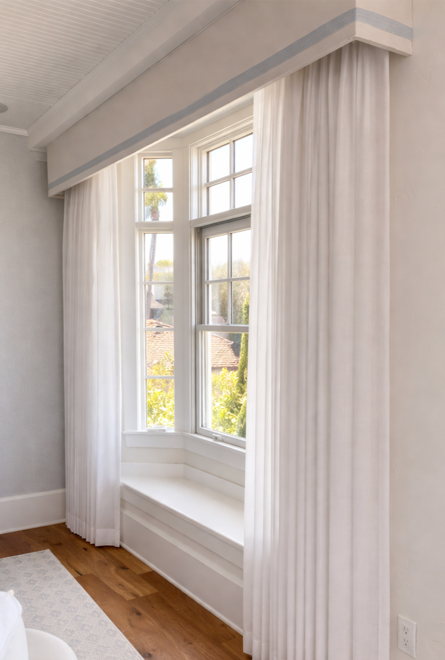 Custom sheer drapery for bay windows in San Diego home