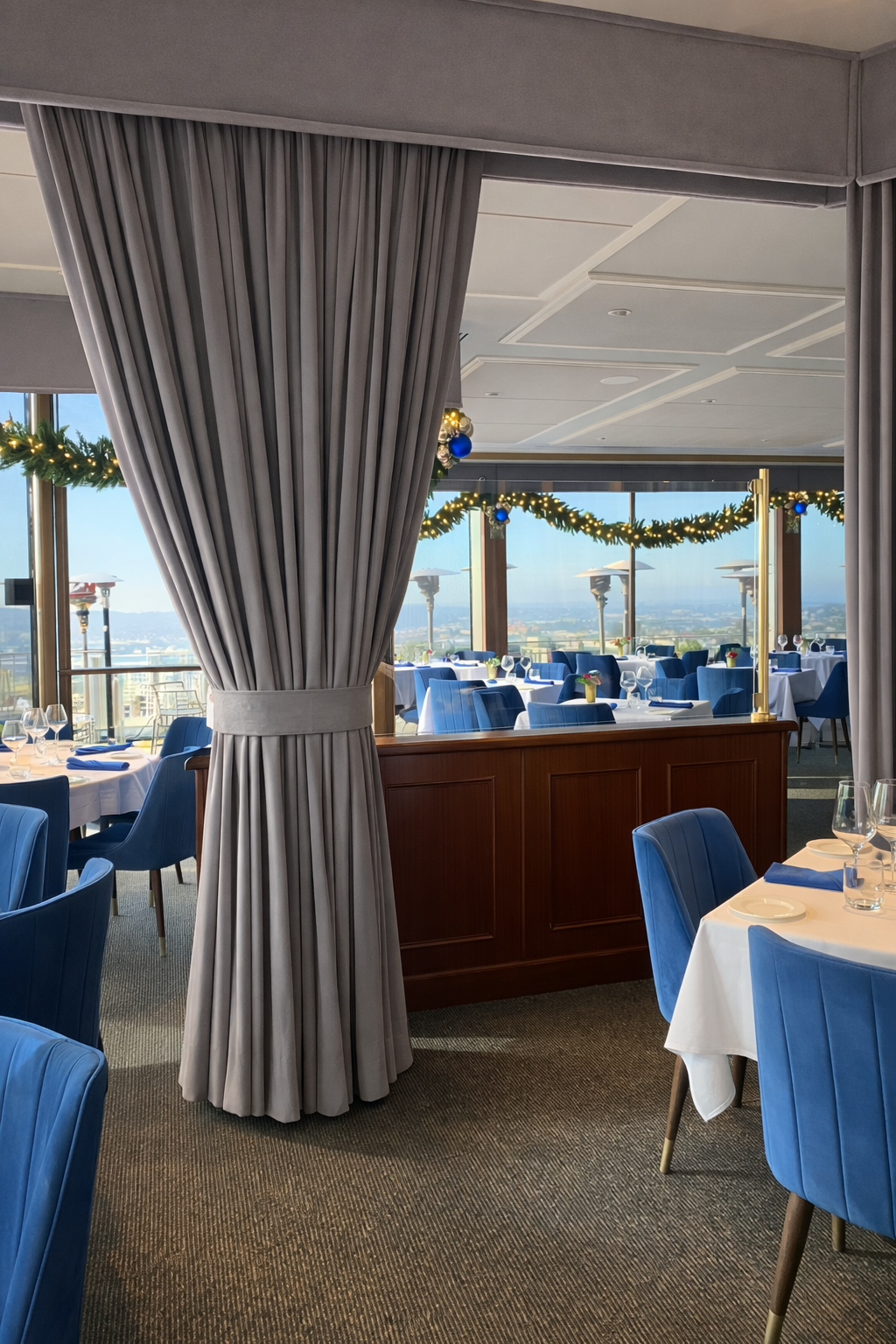 Custom commercial drapery panels for Mister A’s restaurant in San Diego