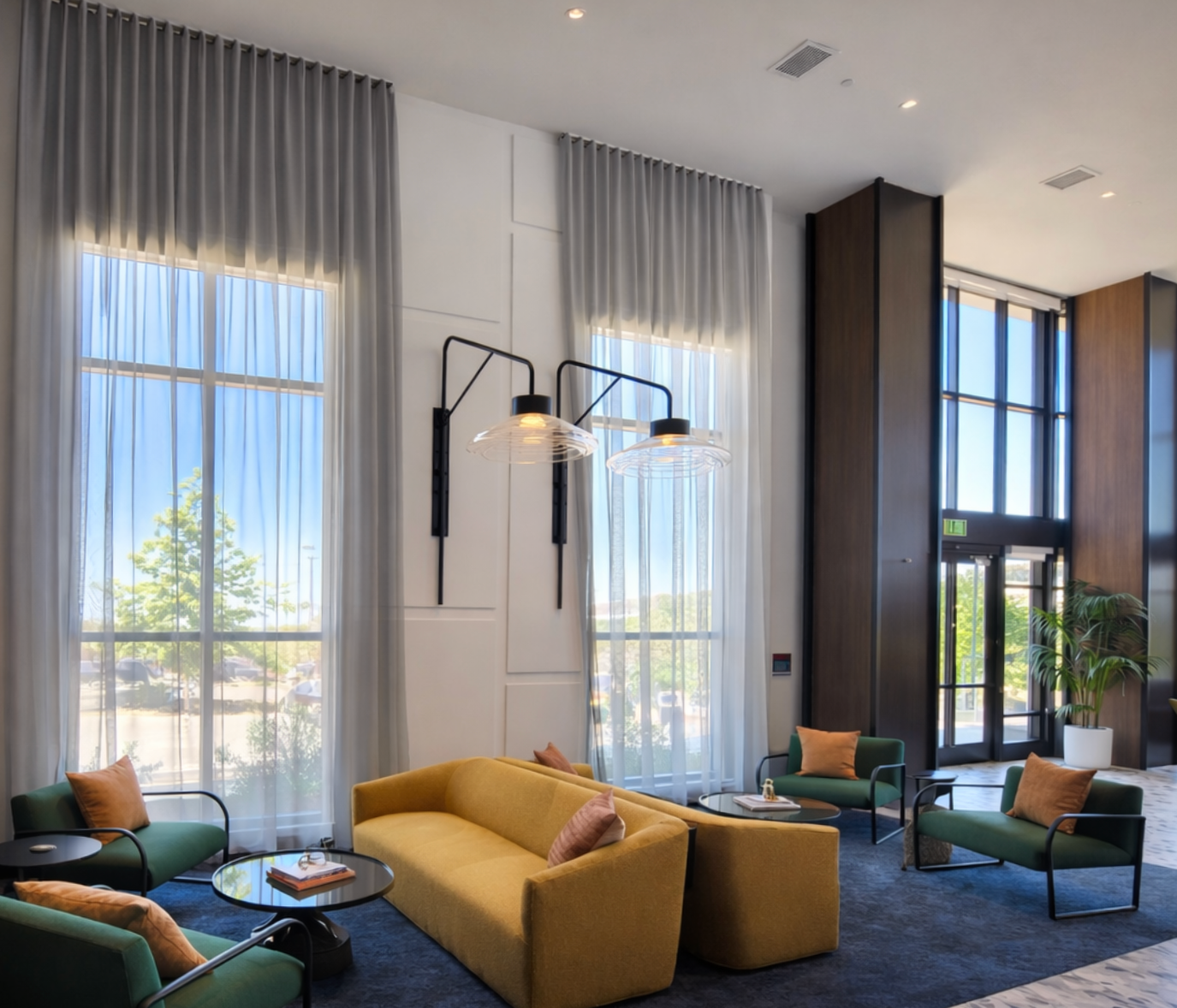 Custom sheer drapery installation for hotel lobby in San Diego at Town and Country Resort