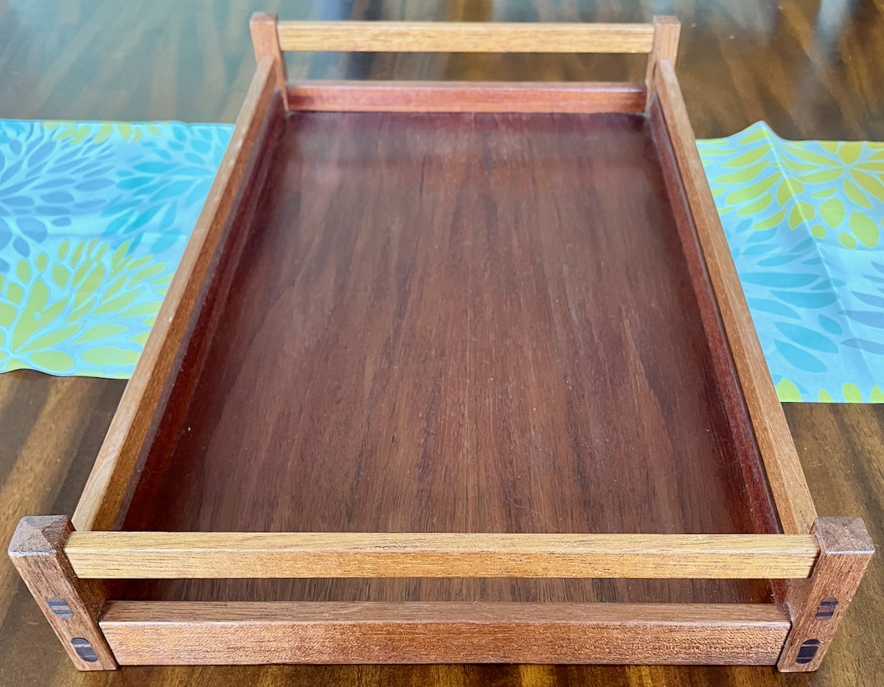 12" deep, 20" wide, 3" tall.
Mahogany