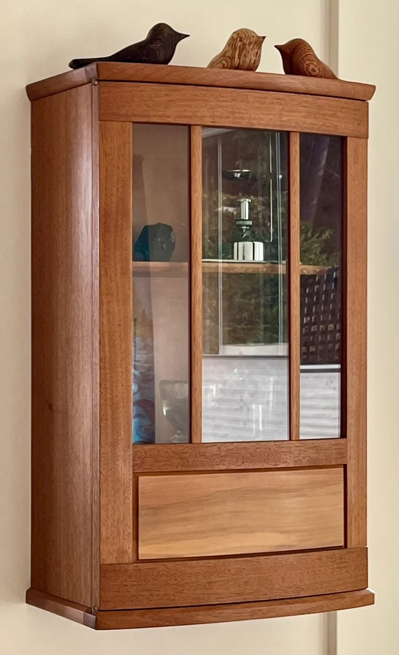 7" deep, 12" wide, 20" tall.

Mahogany, Pear