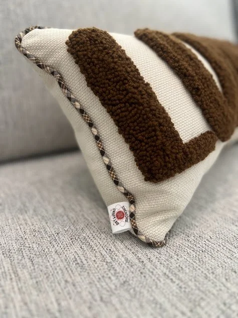 The custom punch needle pillow. Starting at $45 (plus shipping)