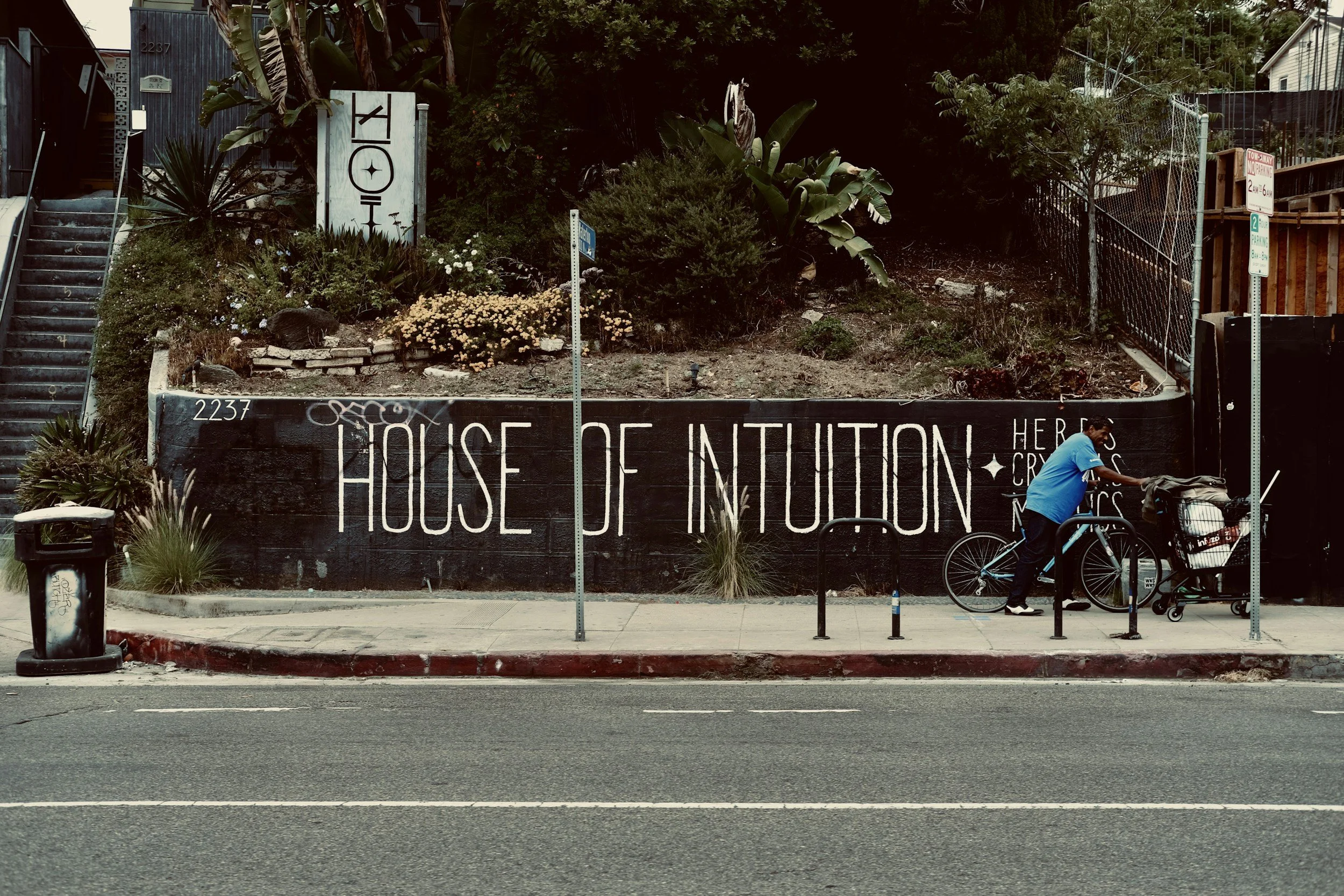 Geometric drawing of an outline square with sections divided by vertical, horizontal, and half circle lines.