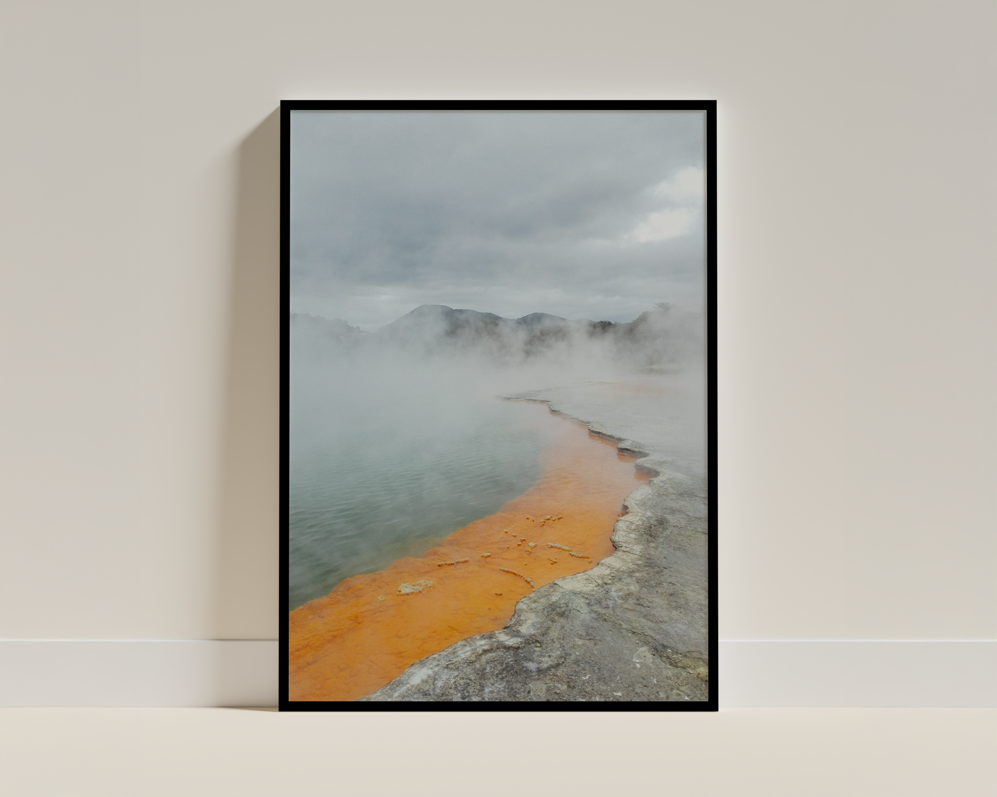 Misty Horizon on an Orange Rock Shore