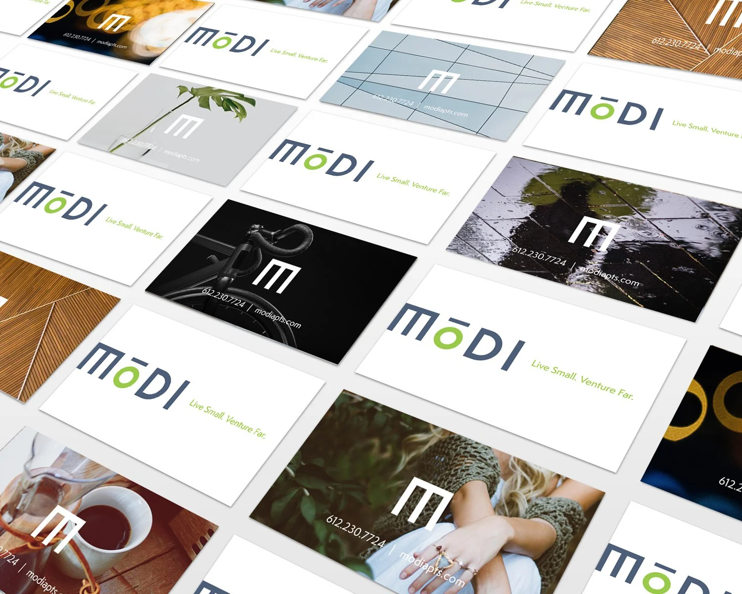 Modi Apartments brand identity and business card designs
