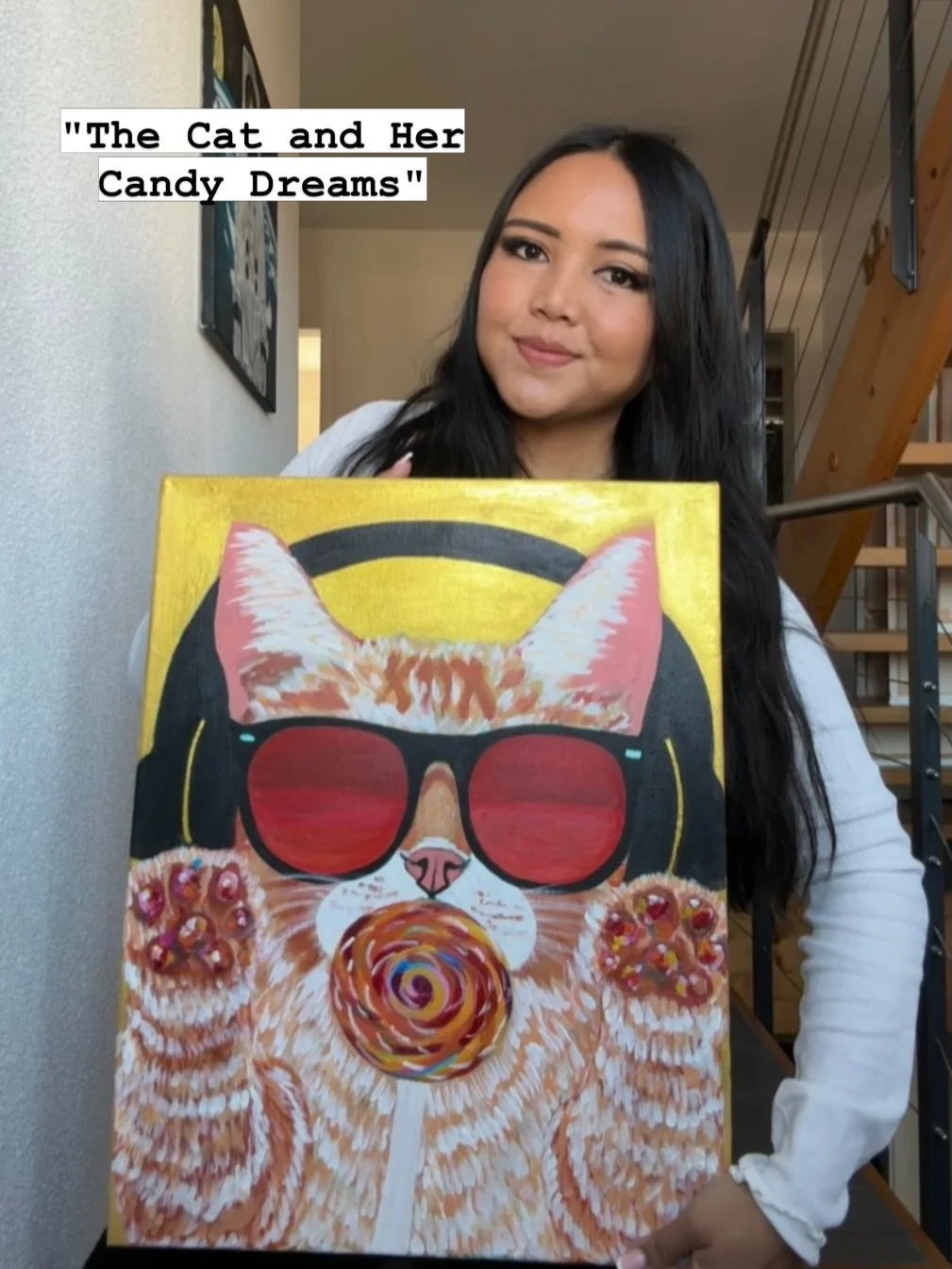 The Cat and Her Candy Dreams (Original Painting, Part of Happiness and Reflection 2026 Collection)- Original Painting, Limited edition signed prints and downloads available soon on my website.🥰

With color on its paws and sweetness on its tongue, th