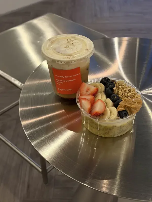 Iced coffee and a fruit bowl from the in-studio café