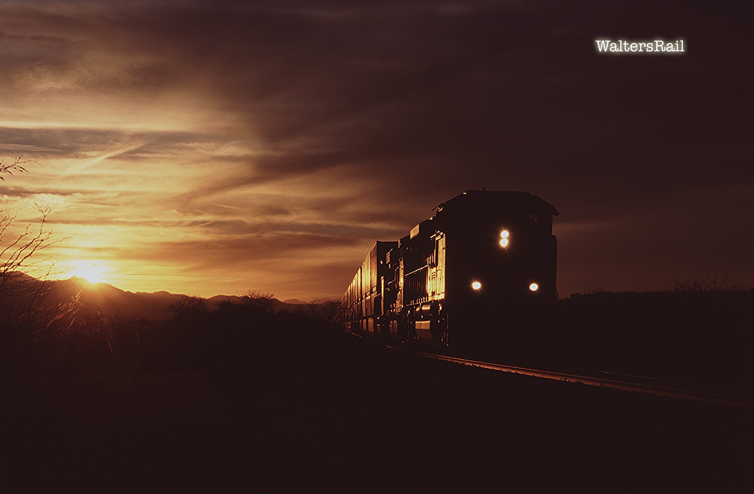A Union Pacific freight approaching Dragoon, Arizona at dusk.  This image makes me think of the prelude of Durefle's Suite, Op. 5.