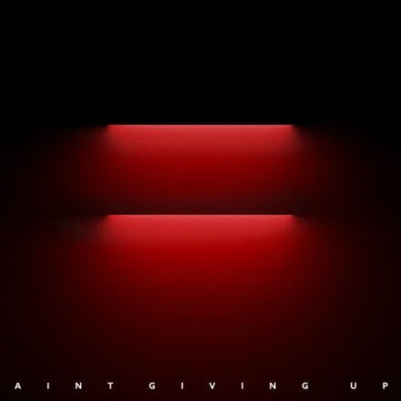 Red and black themed background with the partially visible text 'A INT GIVING UP'.