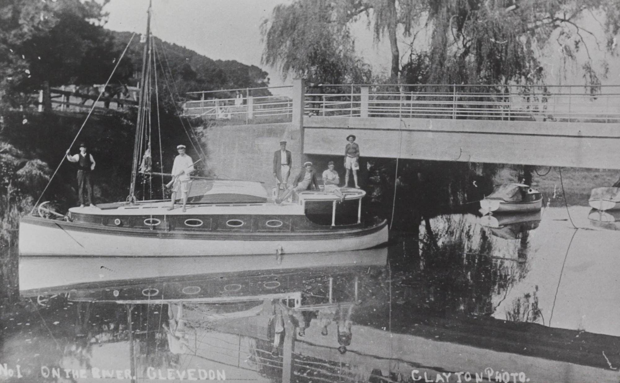 	Boating scene on the Wairoa River at the third Clevedon Bridge, 1908.