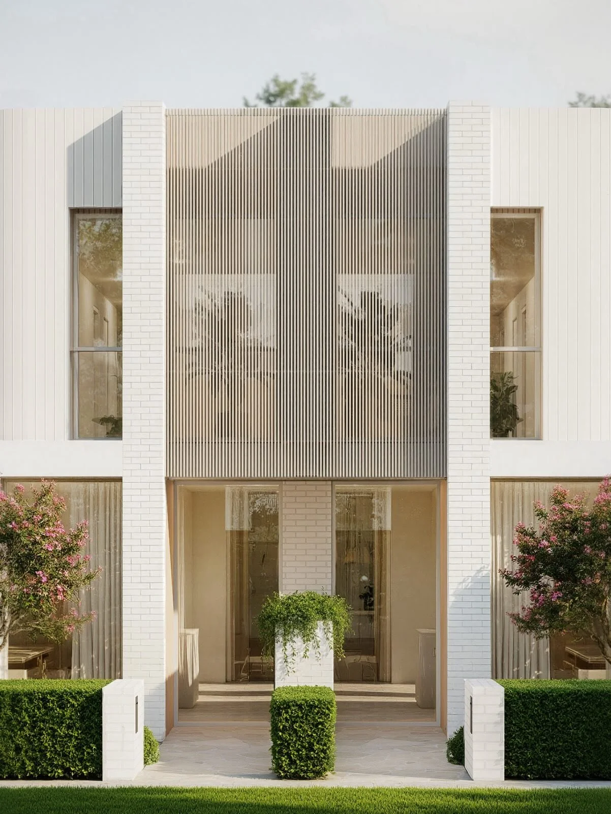 Light and material come together in House B.

Dual living zones open into a carefully crafted kitchen with bespoke joinery and feature stone detailing. The elegant fa&ccedil;ade and landscaped entry create a welcoming threshold, while the overall com