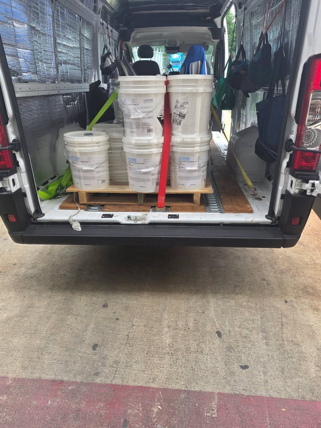 Sprinter cargo van carrying palletized commercial supplies for expedited freight delivery across the United States.