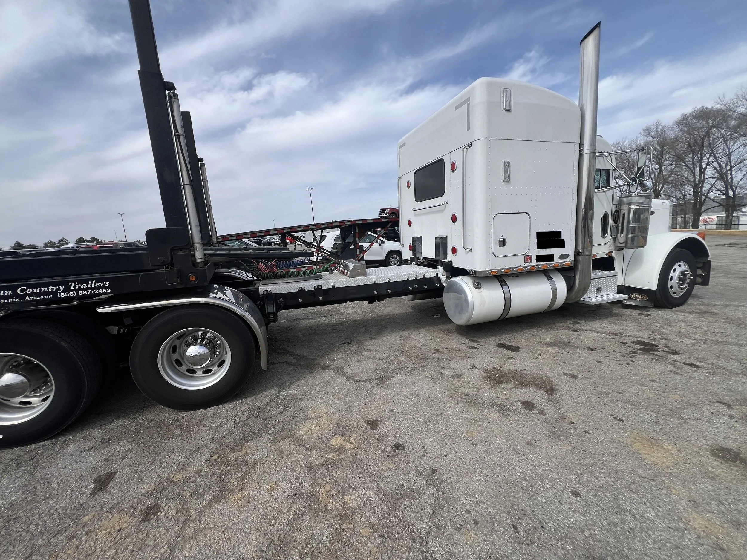 2003 Peterbilt 379 CAT 3406E driver side view with 300-inch wheelbase