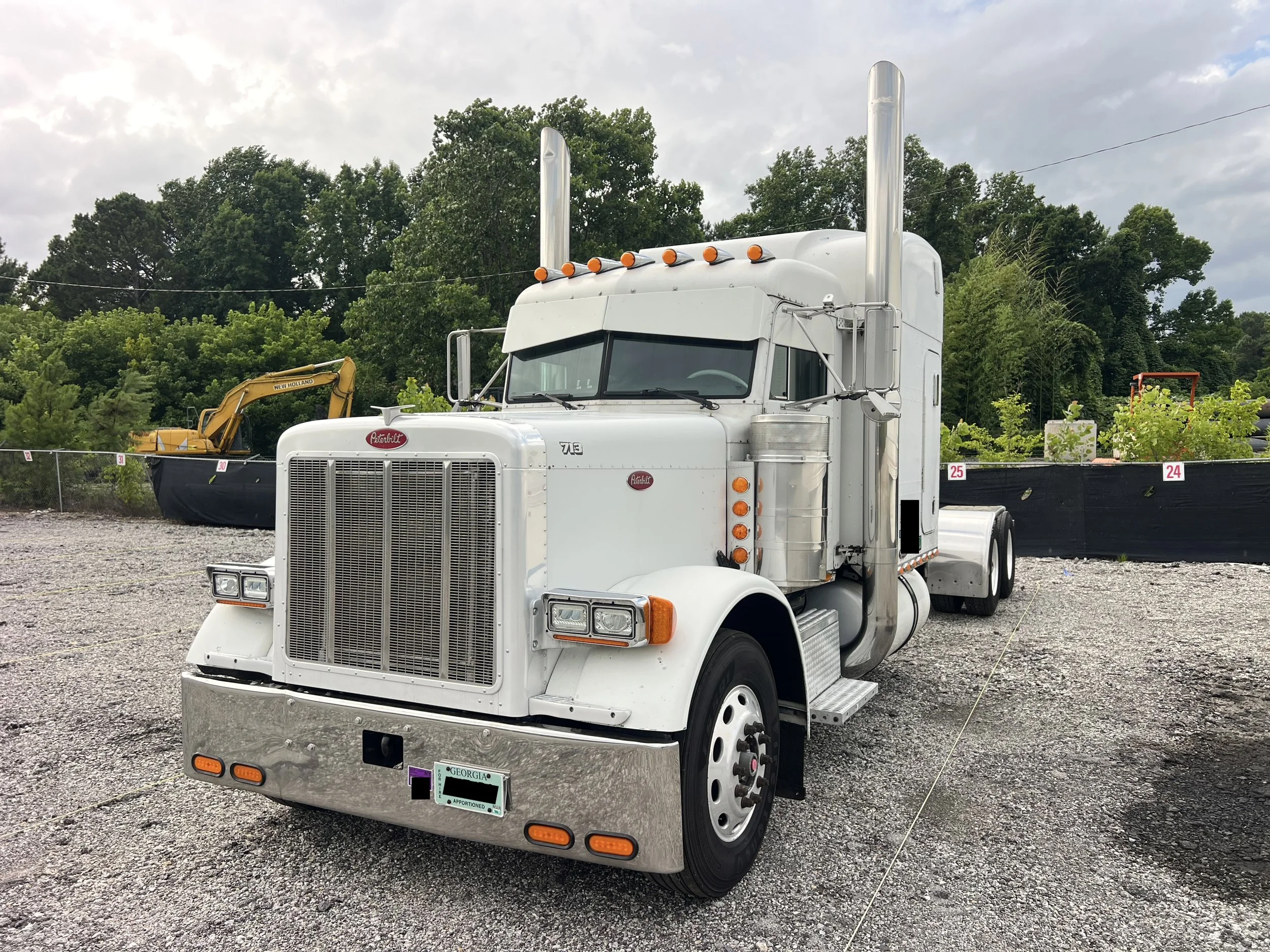 Front grille of white 2003 Peterbilt 379 CAT 3406E