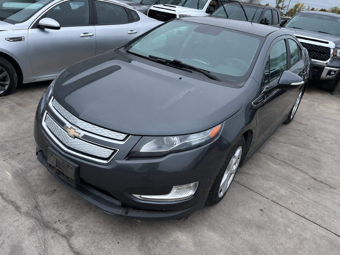 2014 Chevrolet Volt before open vehicle transportation from Miami, FL to Los Angeles, CA by TurboX Logistics.