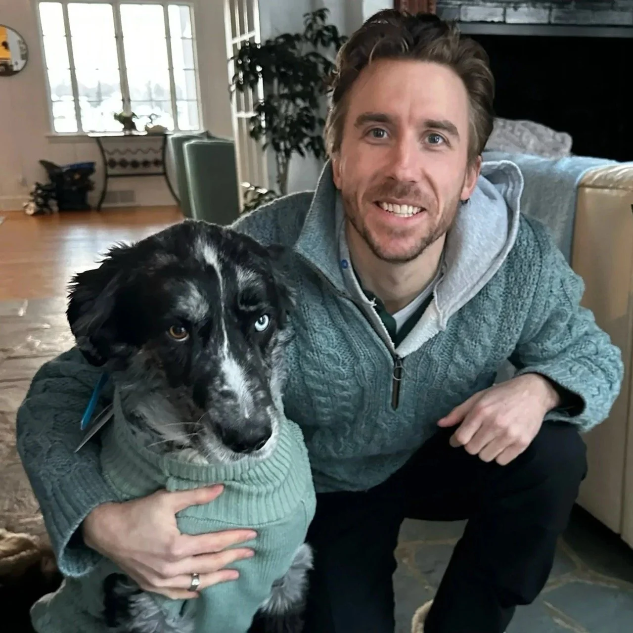 Francis and Bodhi wearing matching sweaters. The cutest.