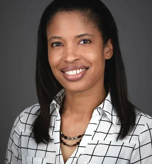 Dr. Barnes smiling at the camera