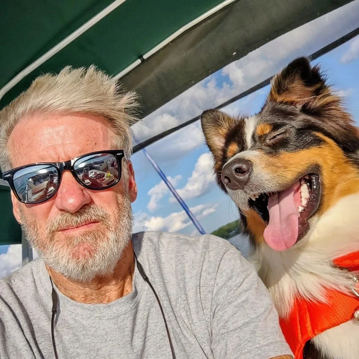 Terry, on a boat with Beckett smiling nearby