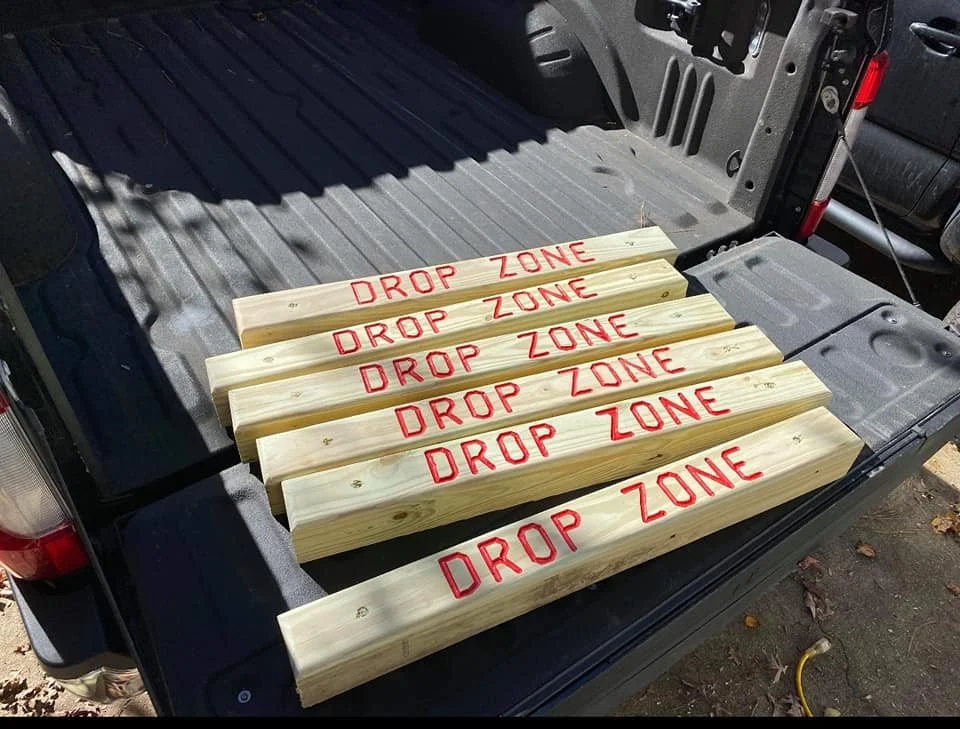 Hand-made Drop Zone marker boards ready to be installed.
