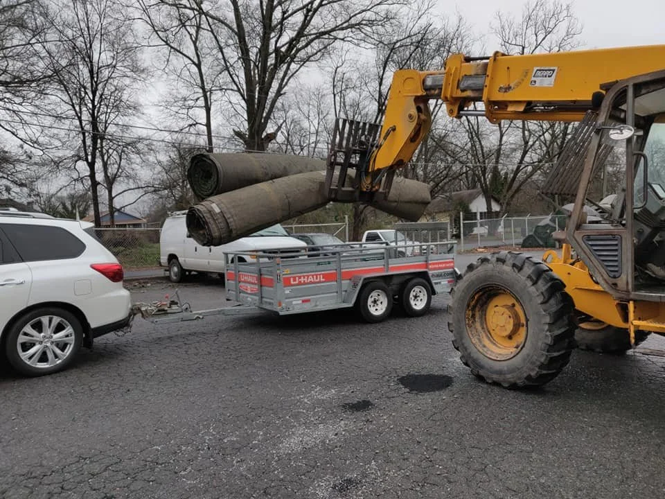 Loading some of the turf used on the tee pads.