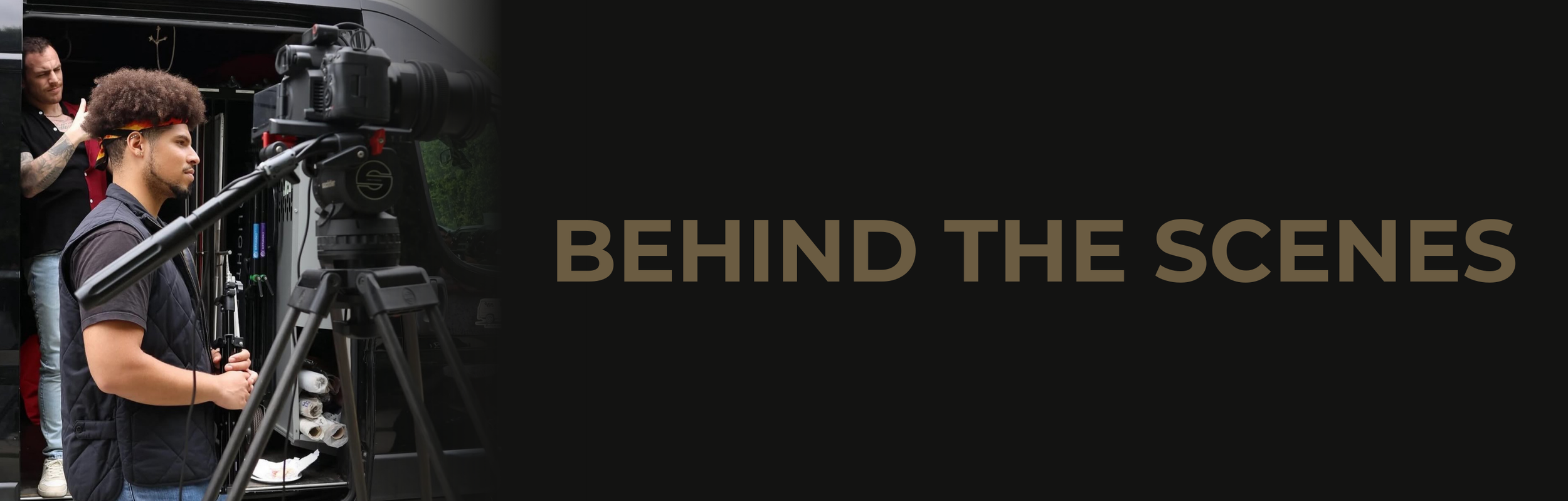 Behind the scenes of film production with a camera operator and crew setting up