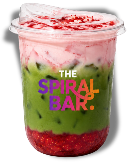 A layered fruit parfait in a clear plastic cup with a lid, containing strawberries at the bottom, sliced kiwi in the middle, and pink and white whipped topping on top, with the text 'The Spiral Bar' on the front.