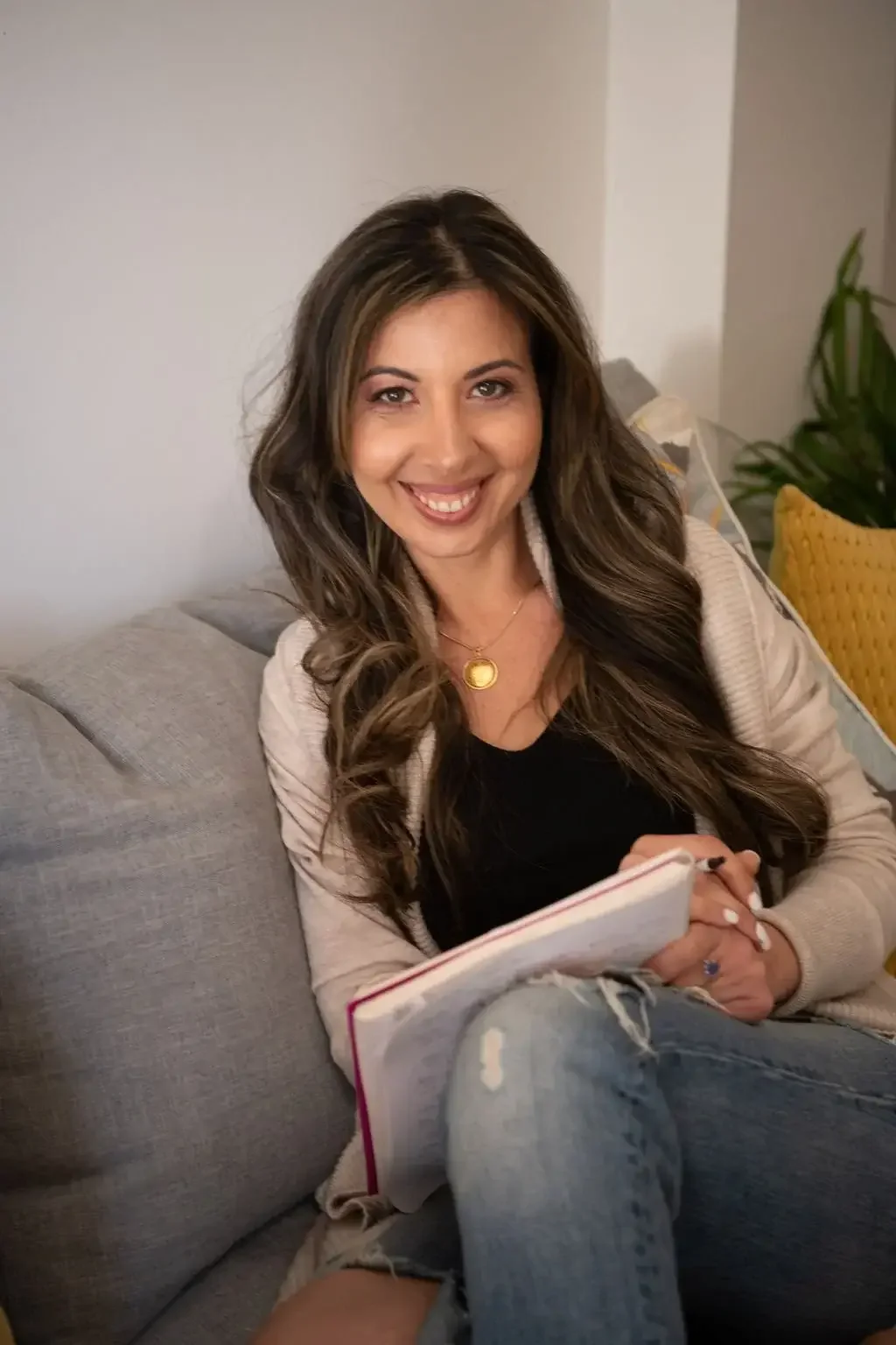 Dr Maria-Elena Lukeides, Sydney Clinical Psychologist, in a natural light setting reflecting her approachable therapy style.