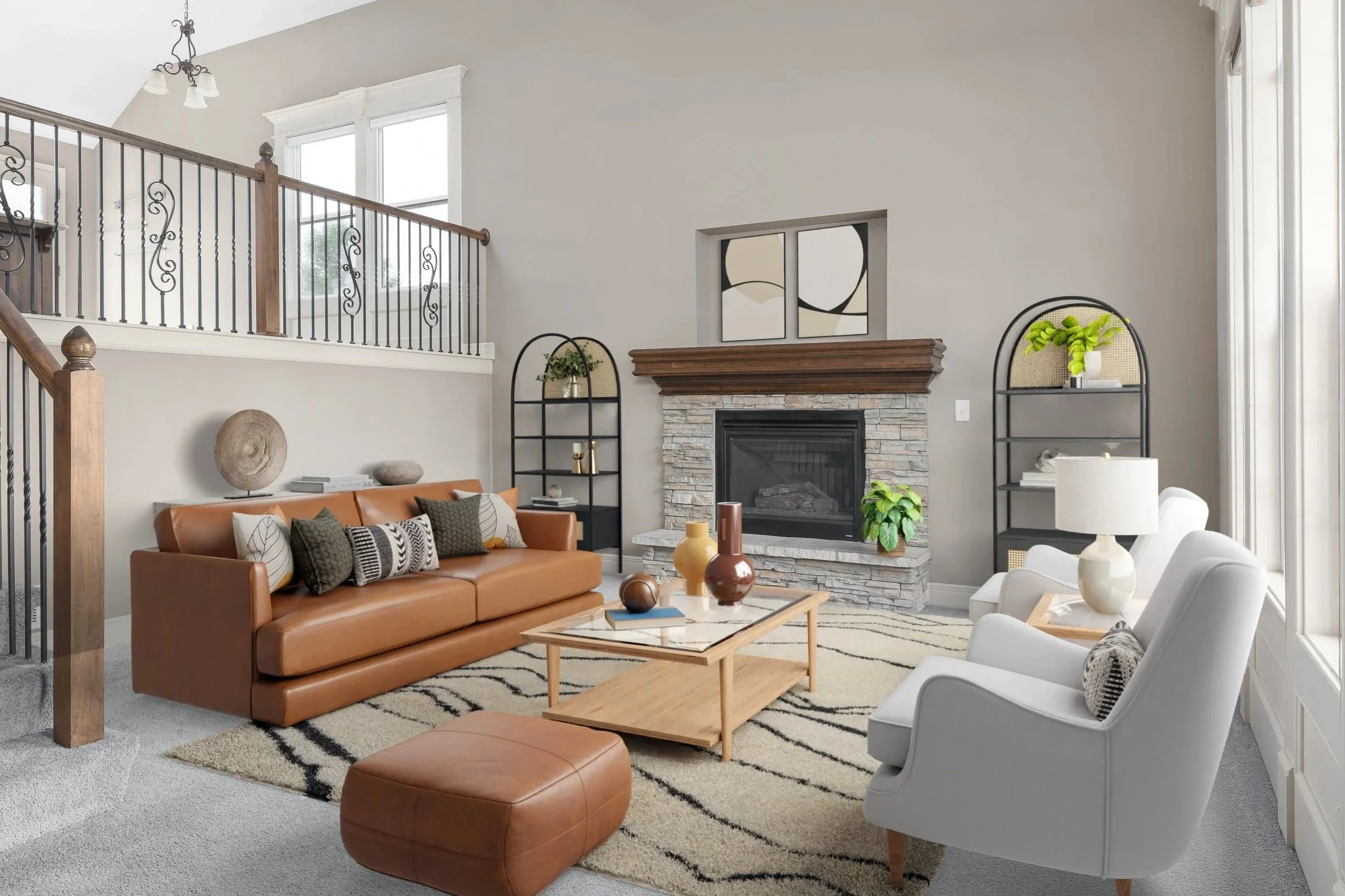 A living room with a brown leather sofa, white armchairs, a stone fireplace with a wooden mantel, black metal shelves with plants and decor, a coffee table with vases, and large windows letting in natural light.