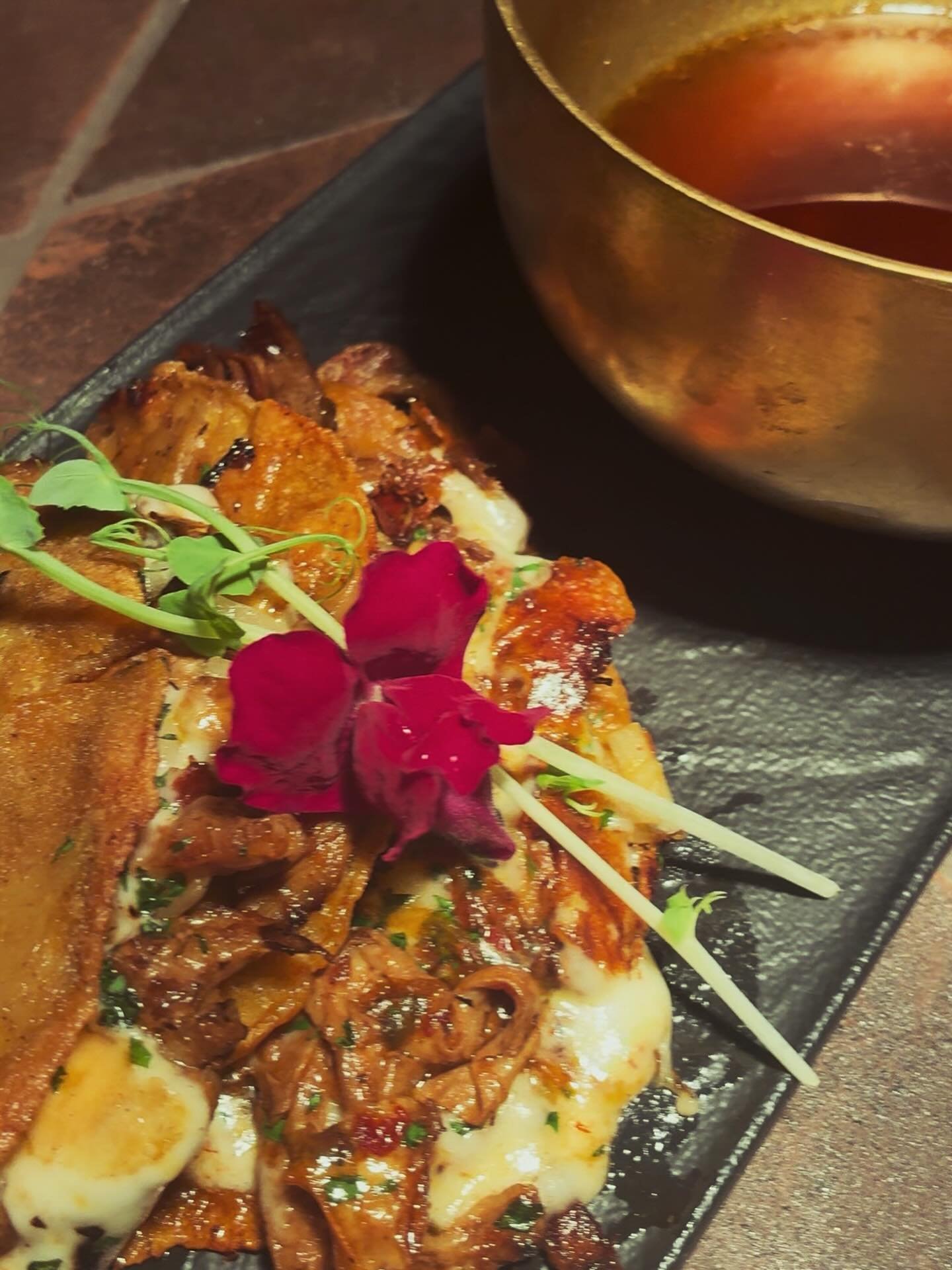 Drippin&rsquo;. Dippin&rsquo;. No shame in the game.

Our Lamb Birria came to show off &mdash; crispy edges, melty cheese pull, juicy slow-braised lamb stacked like it knows it&rsquo;s the star. 🌮🔥

That consomm&eacute; on the side? Yeah&hellip; th