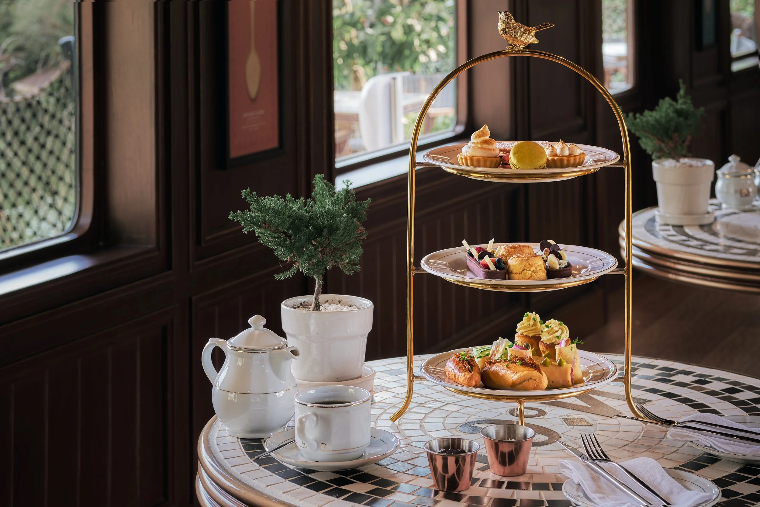 Luxury afternoon Tea served in a train themed resort in Southeast Asia.