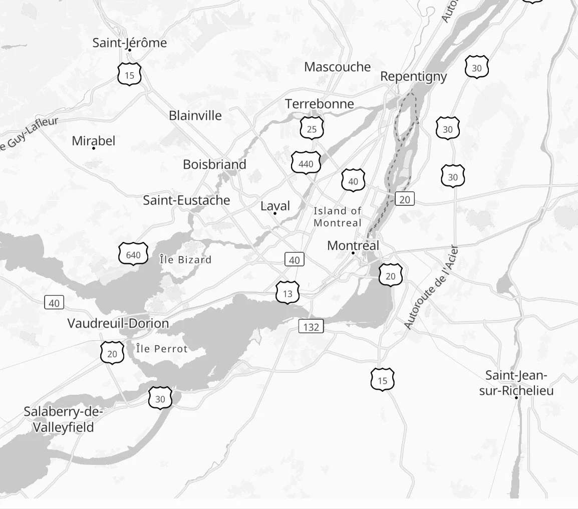 A black and white map of the Montreal area showing city names, highways, and surrounding regions in Quebec, Canada.