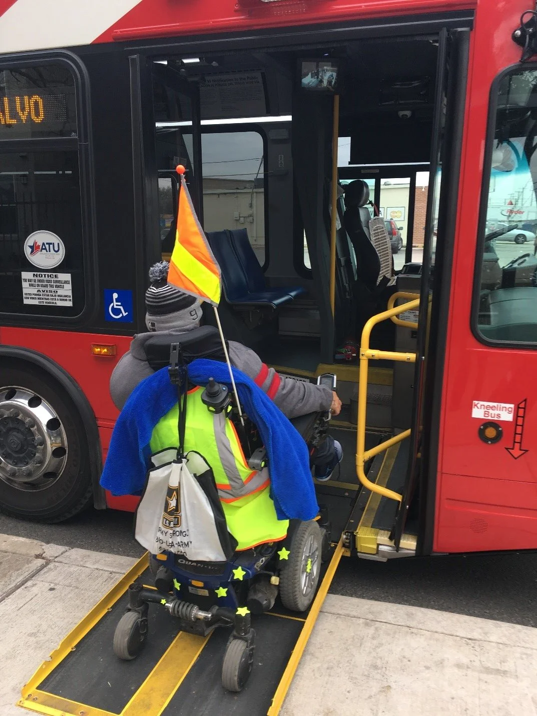 Roseanne and flag on bus