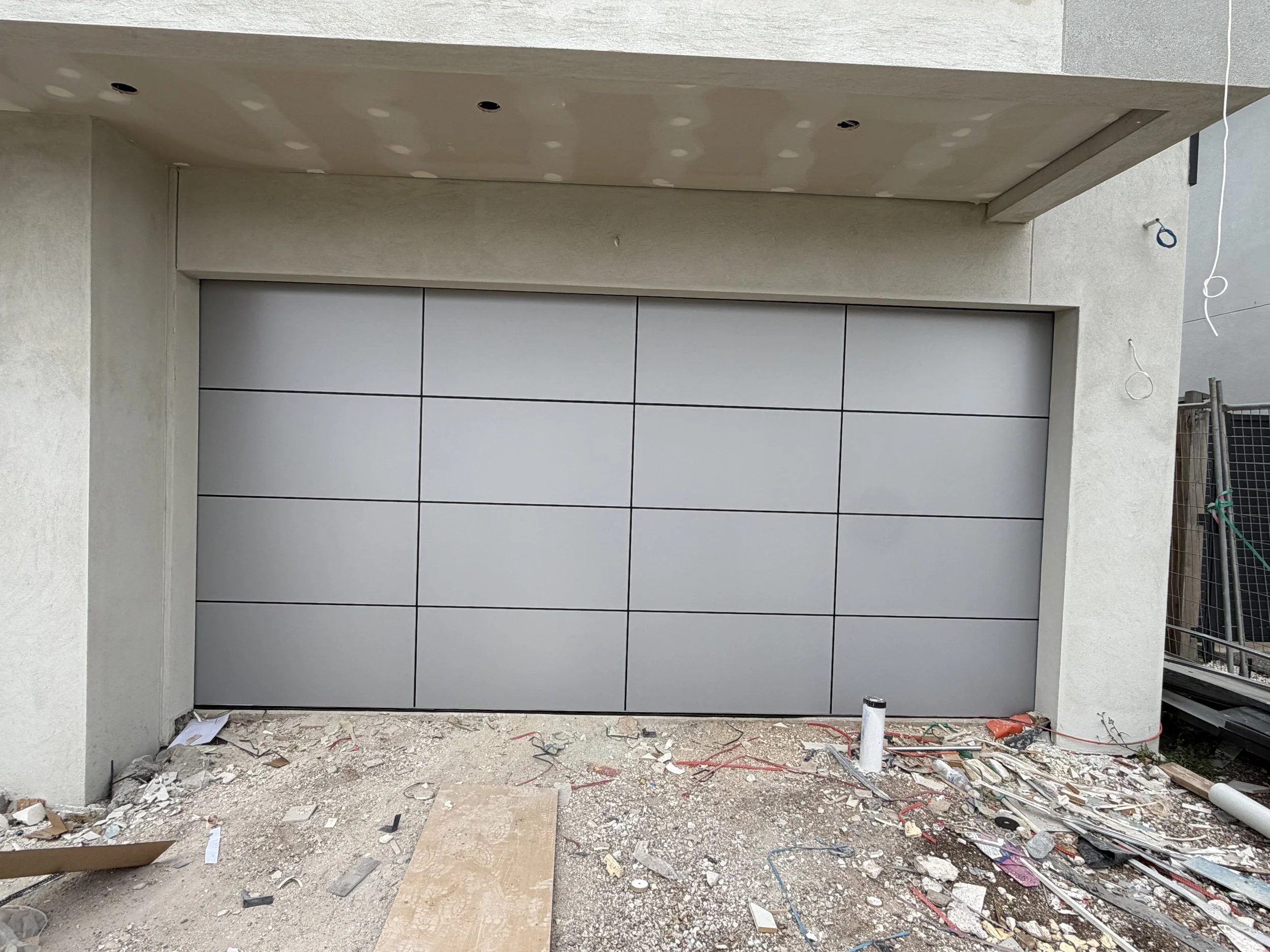 Newly installed garage door on residential home in Rosebud