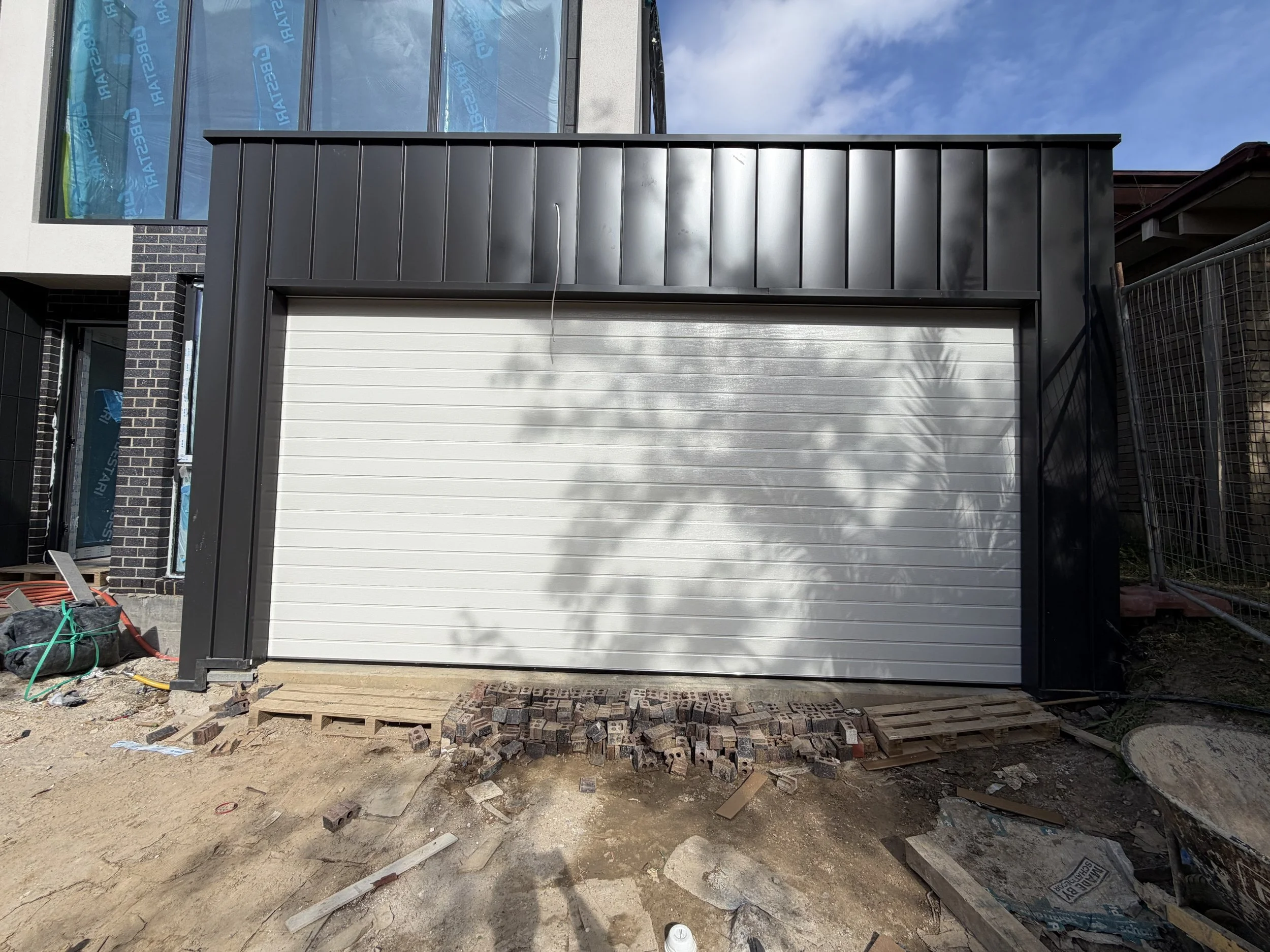 Custom garage door installation with clean finish and alignment