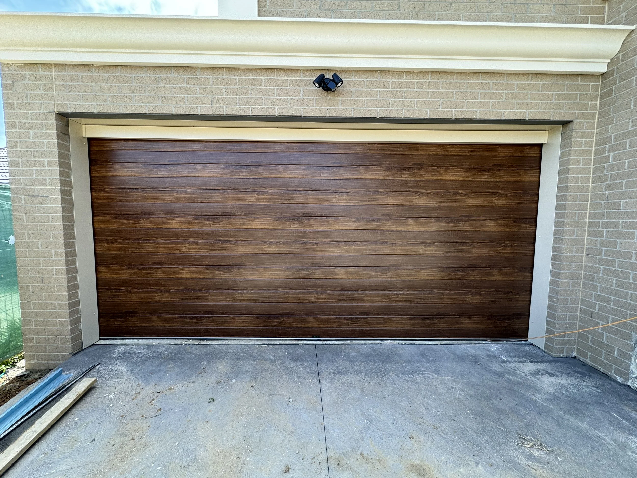Garage door repair completed restoring smooth operation Hastings
