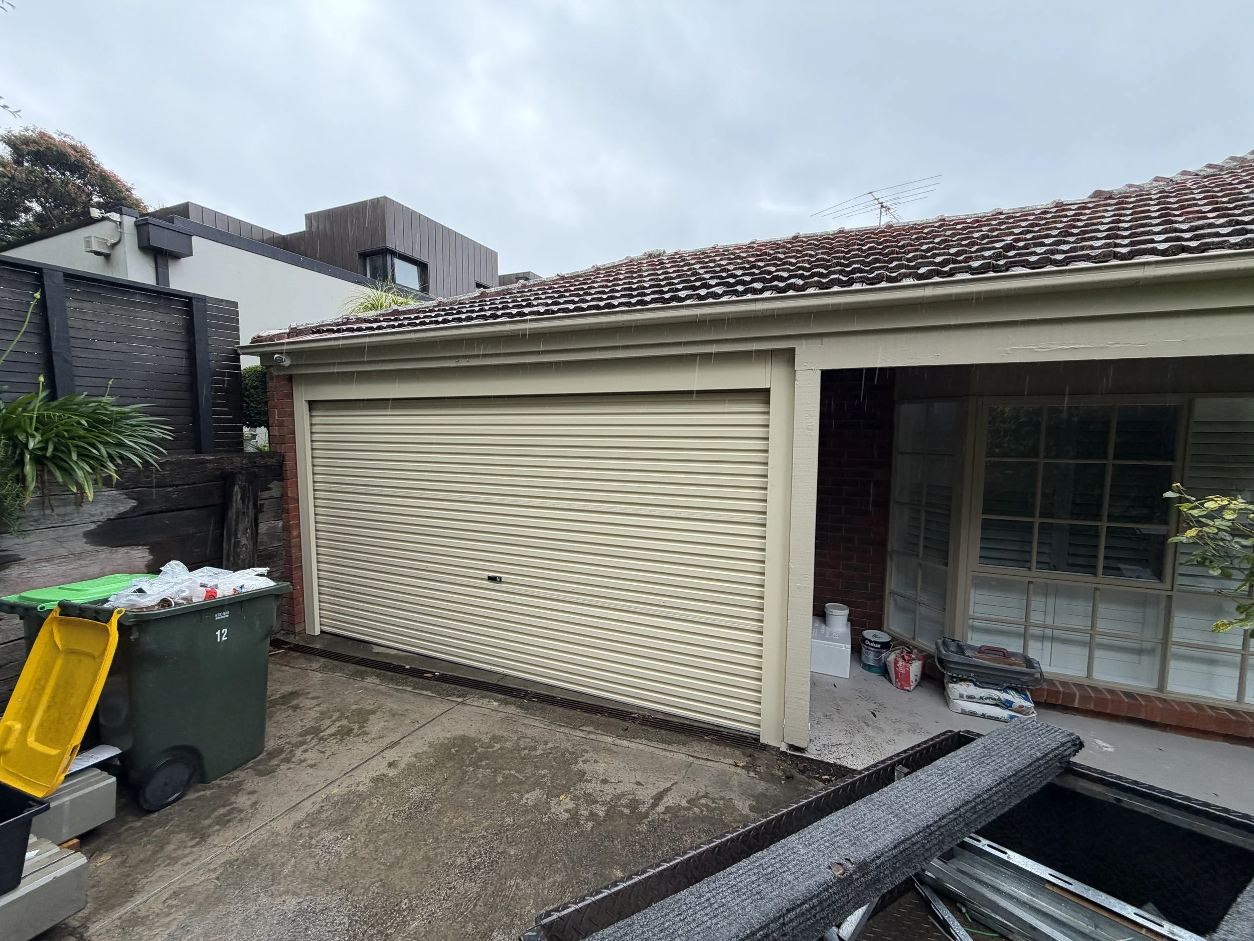 Repaired garage door with new springs and components in Bayside Melbourne