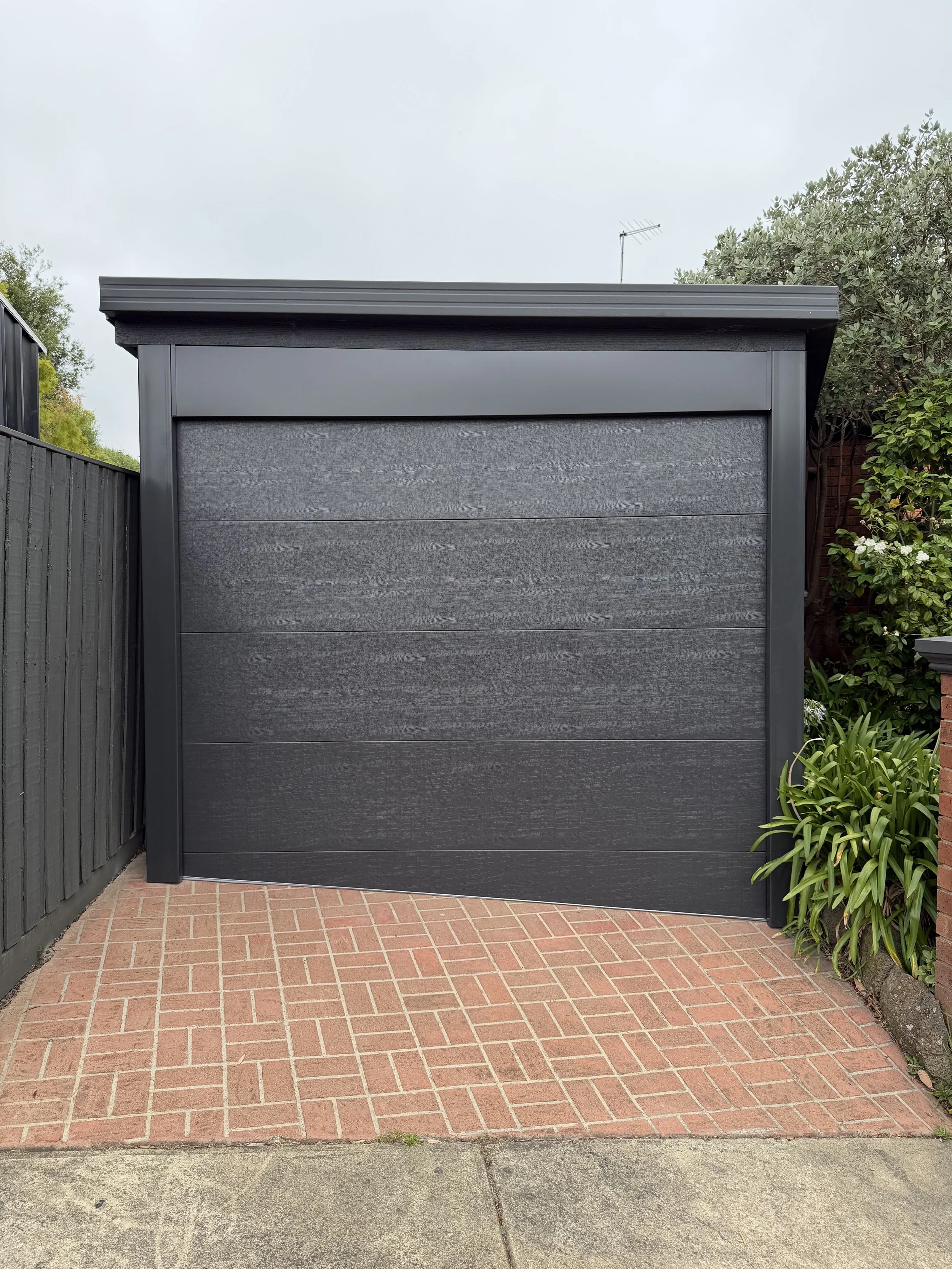 Repaired garage door with new springs and components