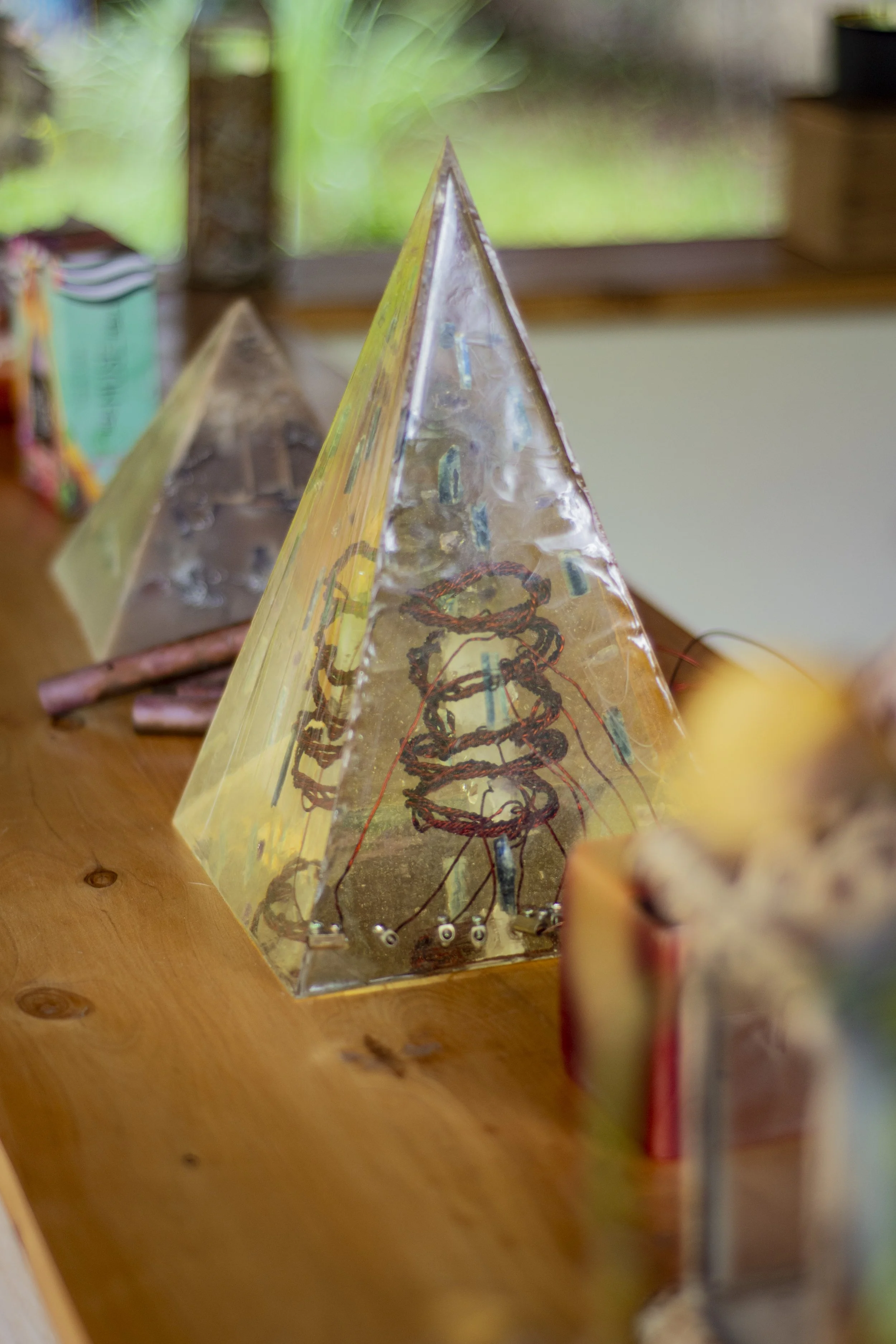 Pyramid and bookcase at House of Afya library