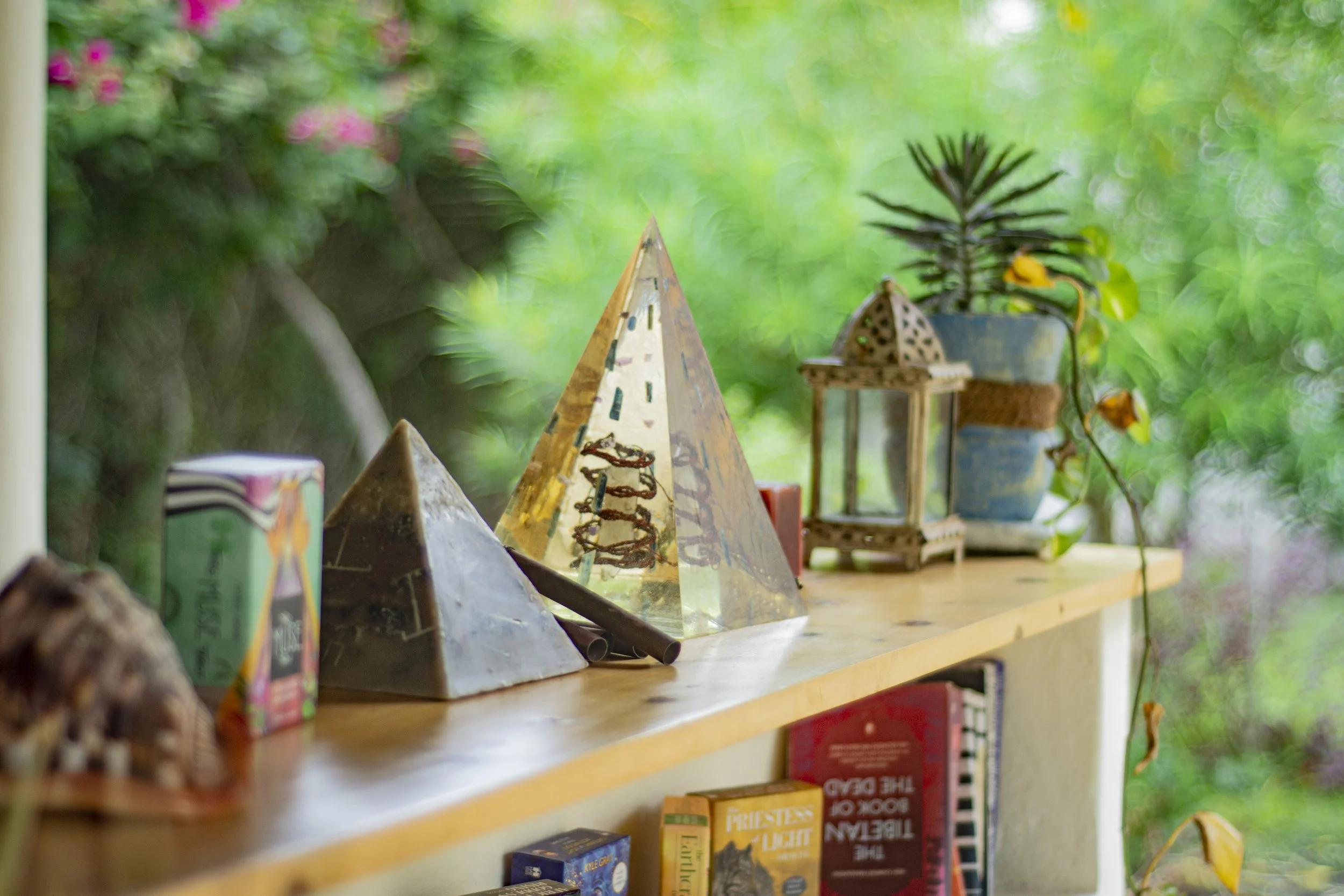 Pyramid and bookcase at House of Afya library
