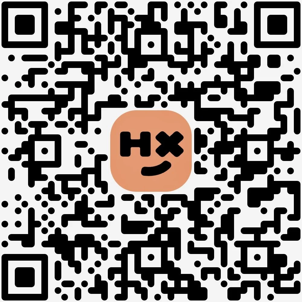 A QR code with a central icon of an orange face with Hanx eyes and a face emoji expression.